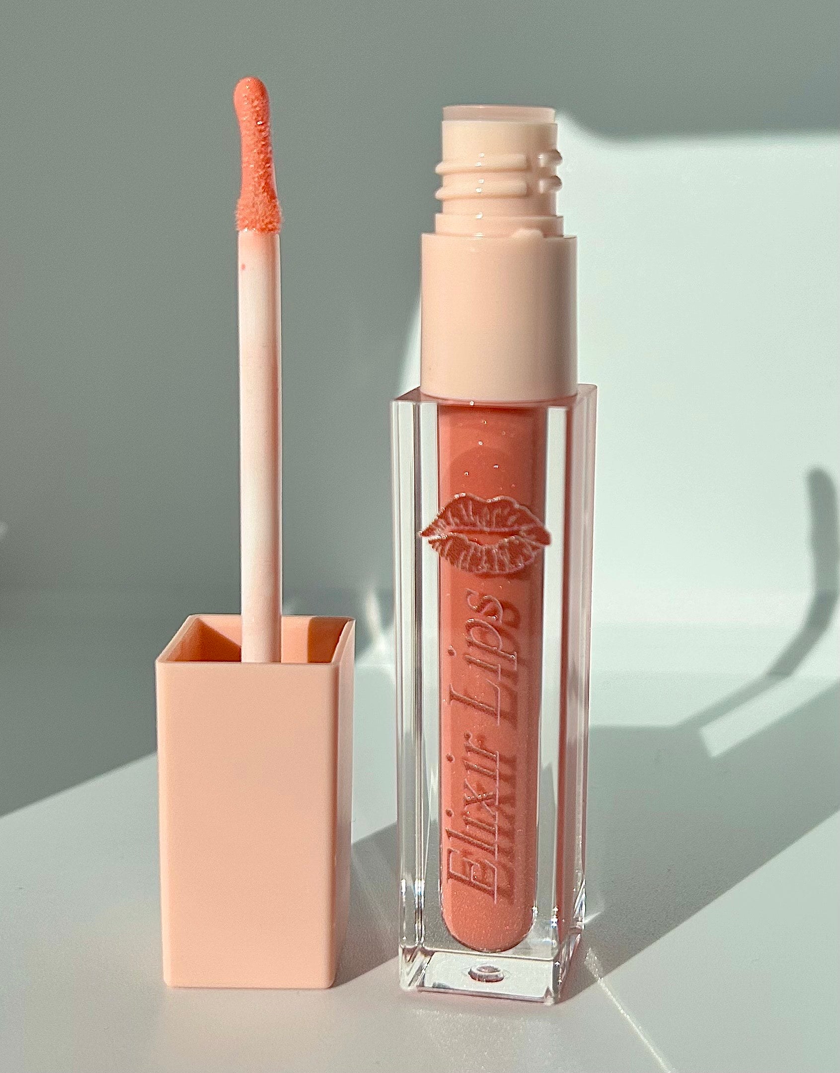 Gloss à lèvres pailleté Peach Pearl – effet volume & brillance intense